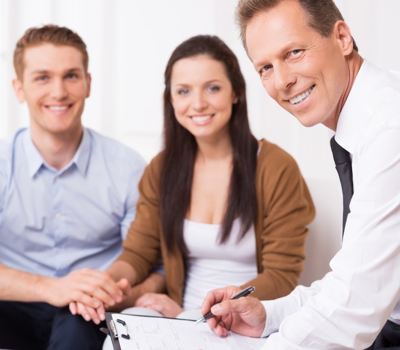 people discussing while taking down notes