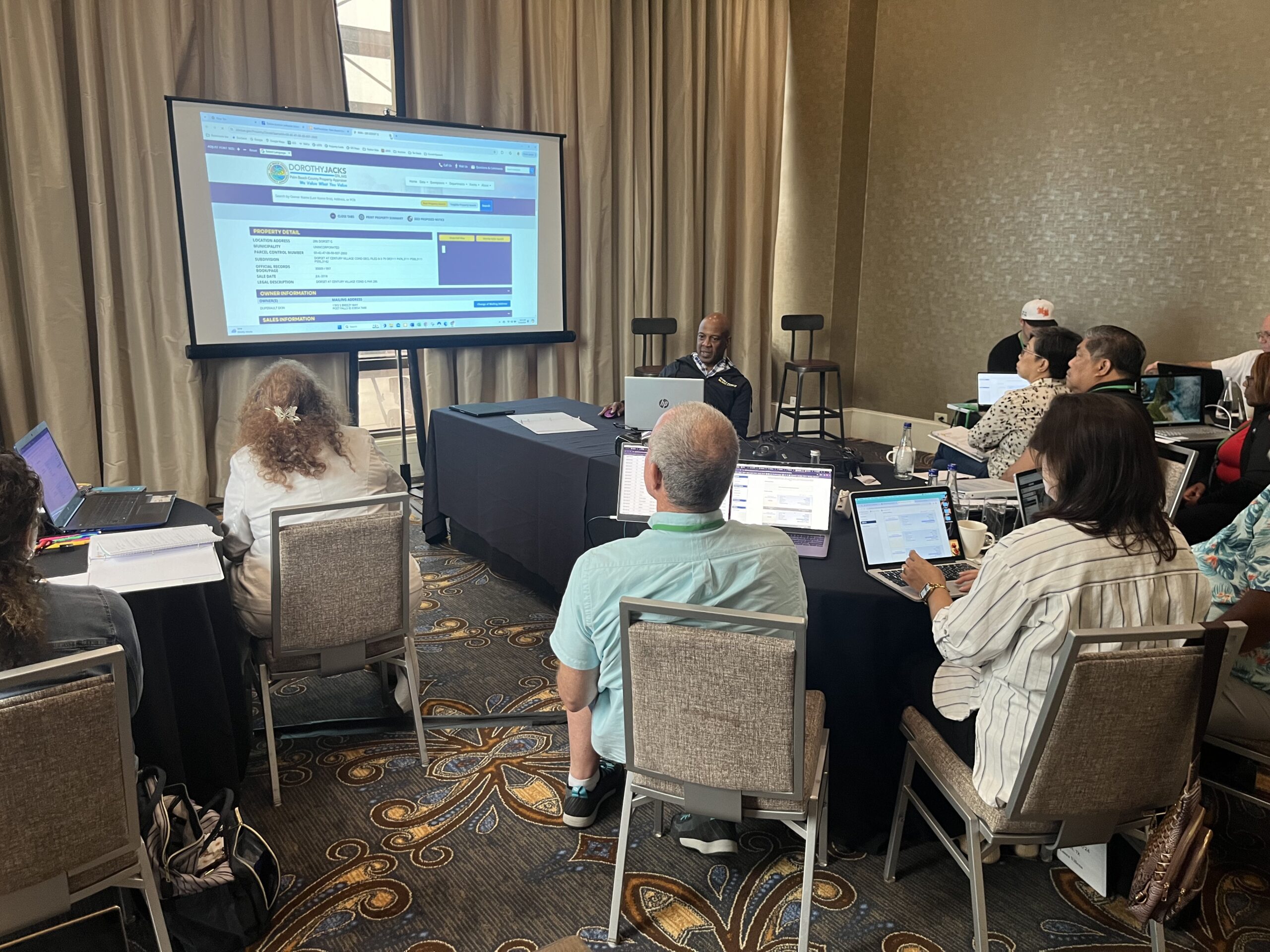 people attending classes on laptops