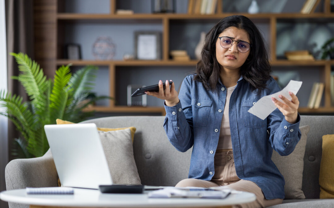 a confused girl on mobile phone
