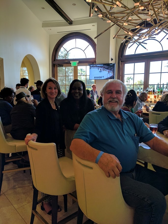 posing for a photograph in an event