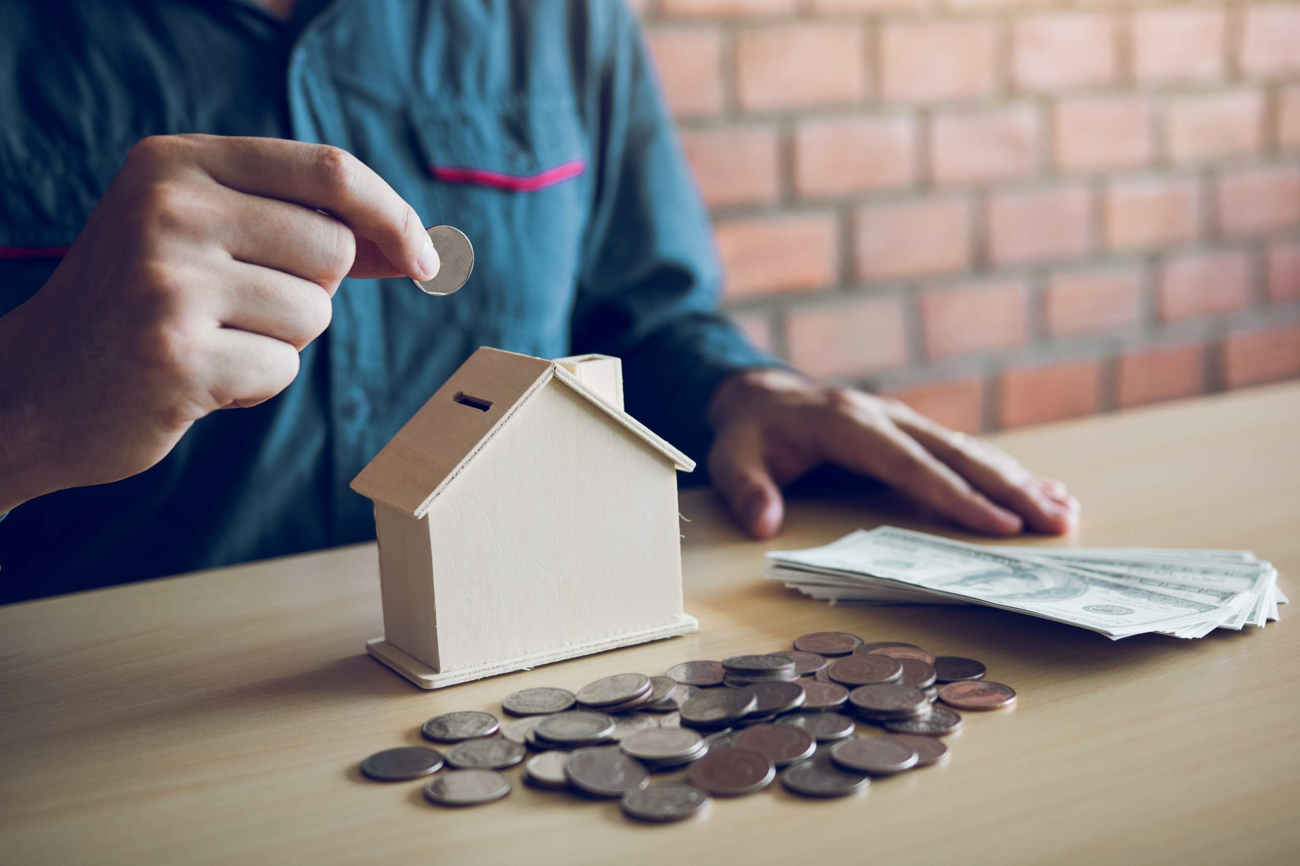 money kept in a miniature house